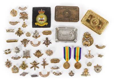 Lot 1005 - Cap Badges.