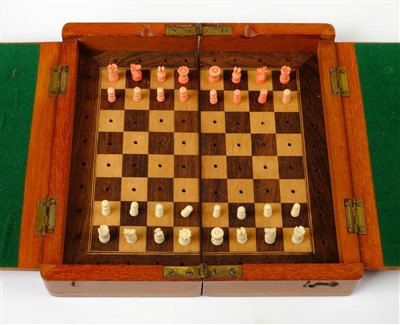 Lot 125 - Ten travelling chess sets