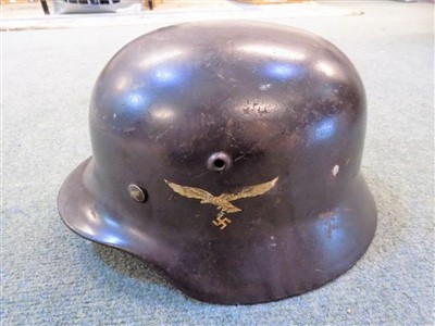 Lot 845 - Combat Helmet.