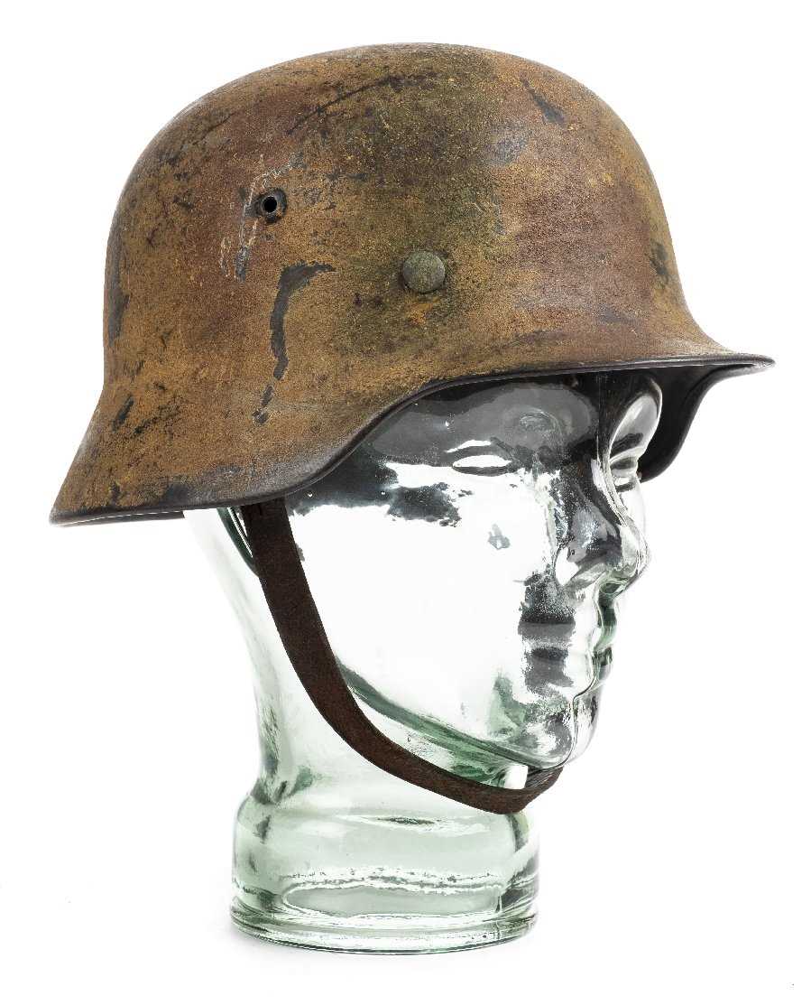 Lot 844 - Camouflage Helmet.