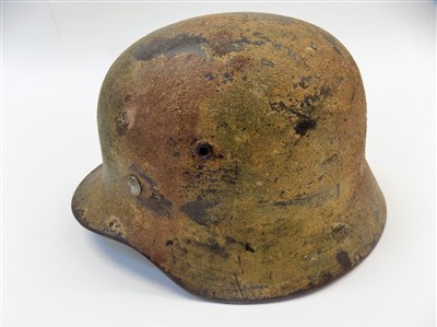 Lot 844 - Camouflage Helmet.