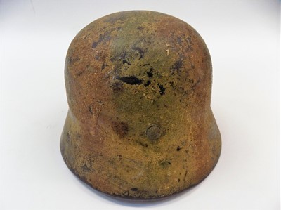 Lot 844 - Camouflage Helmet.