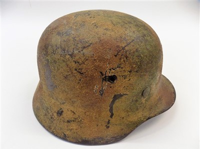 Lot 844 - Camouflage Helmet.