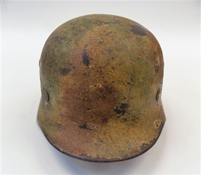 Lot 844 - Camouflage Helmet.