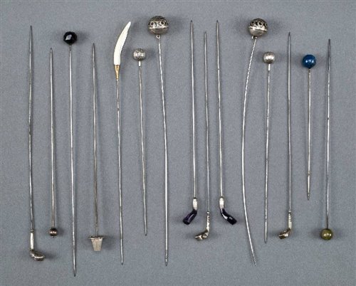 Lot 312 - Hat pins.