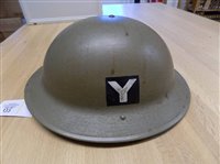 Lot 233 - WWII Helmet.