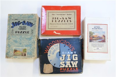 Lot 518 - Jigsaw Puzzles.  A collection of 19 jigsaw puzzles, early 20th century