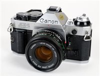 Lot 348 - Canon AE-1 Program camera and lenses.