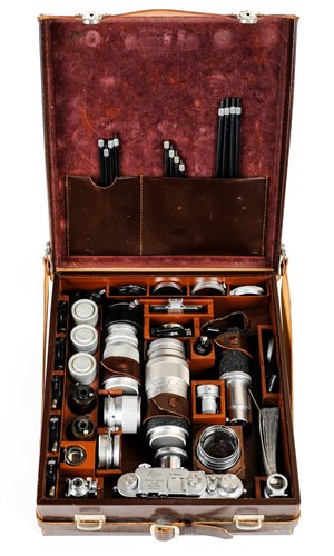 Lot 379 - Leica III chrome camera with 5 lenses and accessories