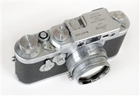 Lot 387 - Leica IIIg chrome rangefinder with Summitar 50mm f/2 lens.