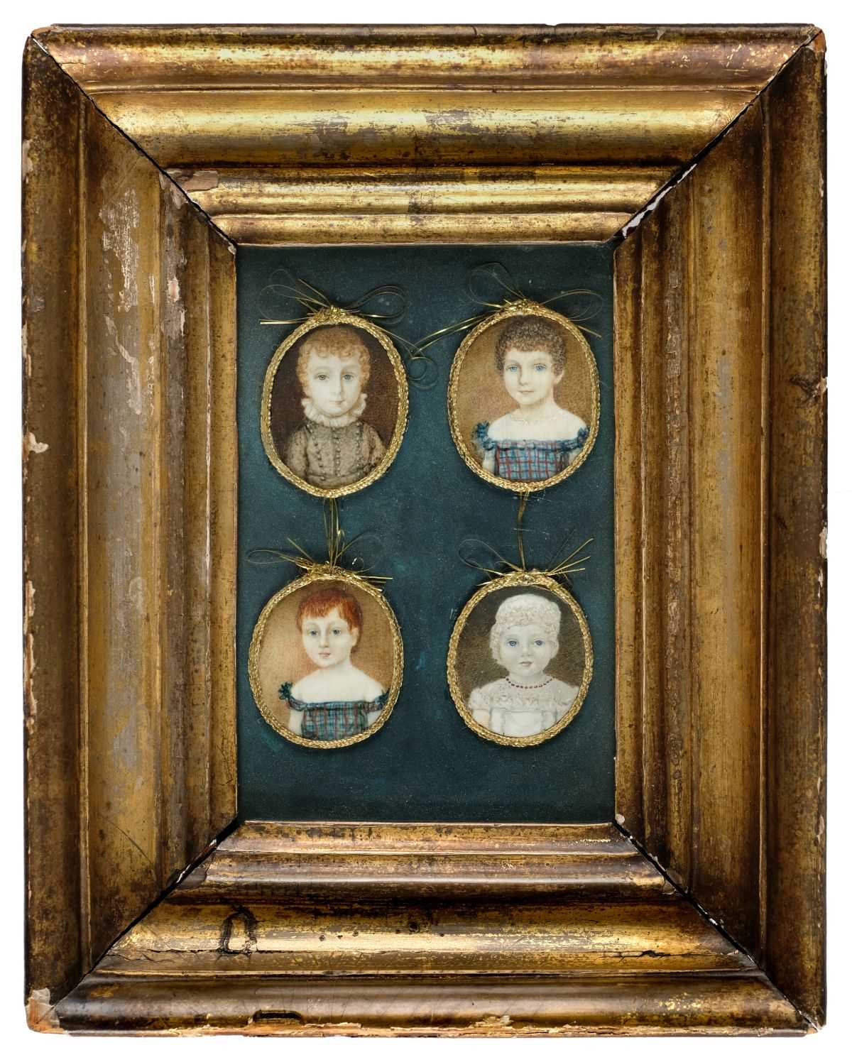 Lot 424 - Portrait Miniatures. A framed set of four oval miniature paintings of children, 1821