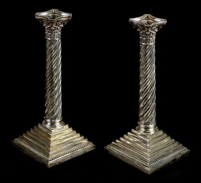 Lot 40 - Candlesticks. A pair of Victorian silver Corinthian column candlesticks by H.F., London, 1891