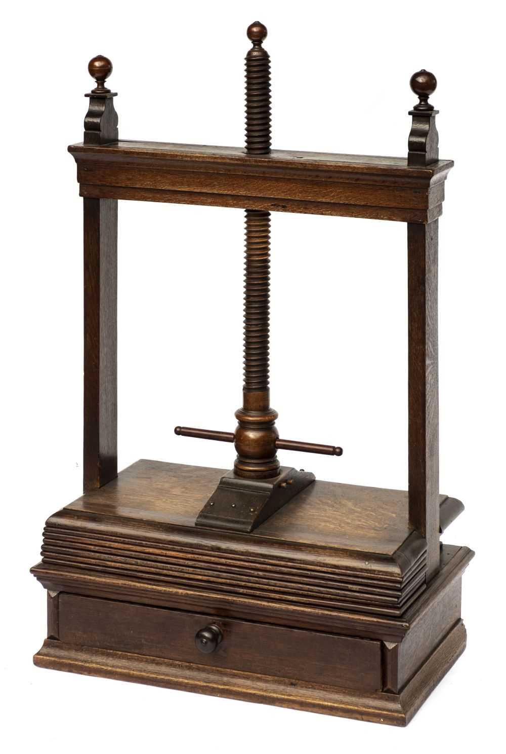 Lot 122 - Book press. A fine stained oak book or linen press with integral fitted drawer, 19th century