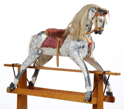 Lot 522 - Rocking Horse. An English dapple grey rocking horse by J. Collinson and Sons, circa 1950s