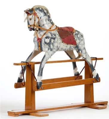 Lot 522 - Rocking Horse. An English dapple grey rocking horse by J. Collinson and Sons, circa 1950s
