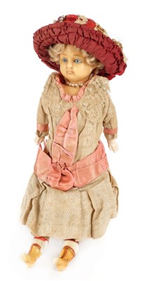 Lot 515 - Doll. A late Victorian wax headed doll