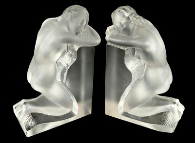 Lot 88 - Lalique (Rene, 1860-1945). A pair of Lalique glass bookends in the form of a kneeling female nude