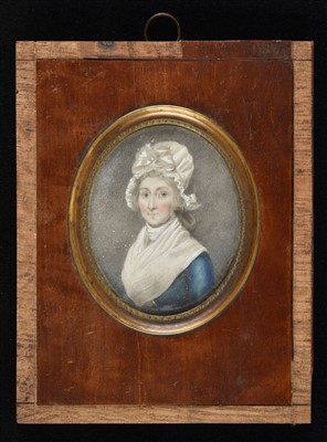 Lot 247 - Miniature. Portrait of a woman in a mob cap, circa 1800