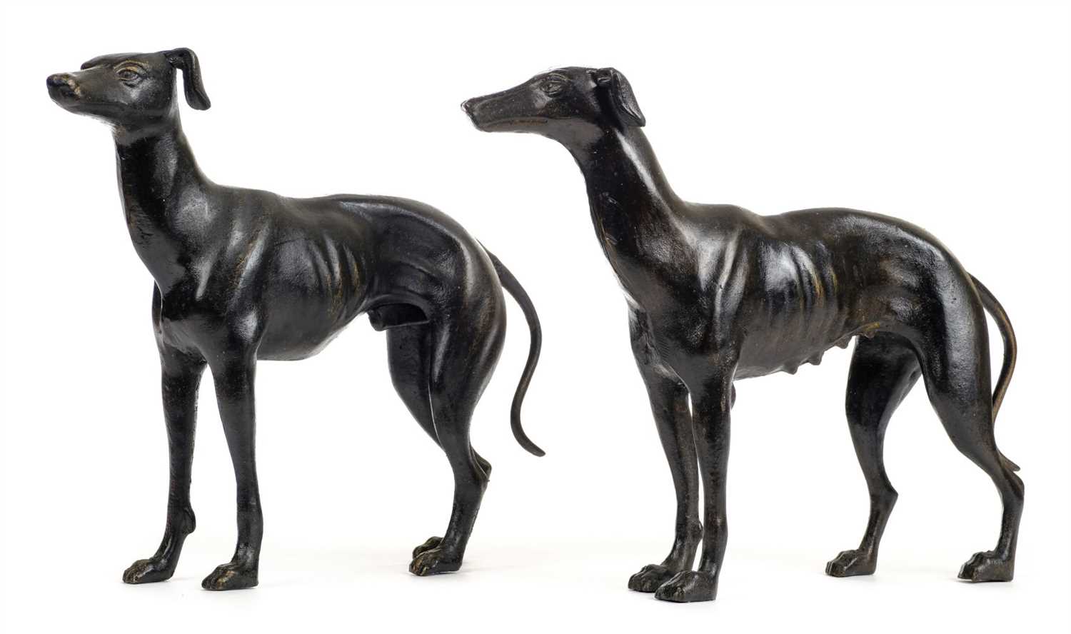 Lot 148 - Bronze greyhounds. A pair of late 20th century bronzed greyhounds