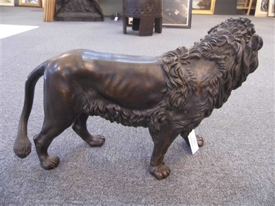 Lot 149 - Bronze Lion. A 19th century bronze model of a lion