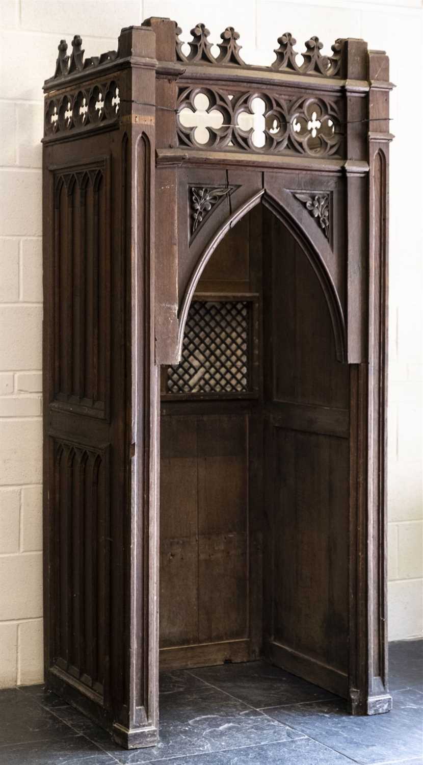 Lot 131 - Confessional Box. A section of a Victorian Gothic carved oak confessional box