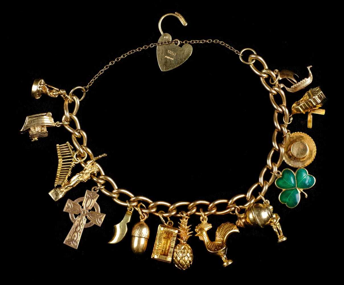 Lot 2 - Bracelet. A 9ct gold hollow link charm bracelet