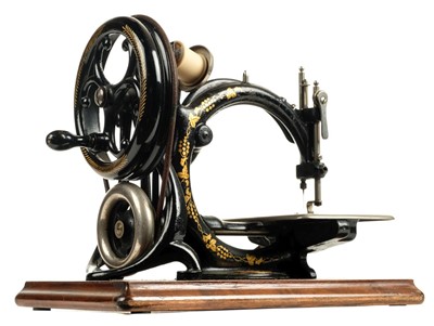 Lot 75 - Sewing machine. A late 19th century sewing machine by Willcox & Gibbs circa 1880