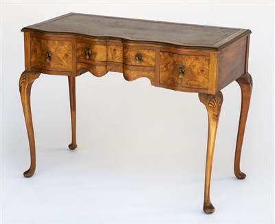 Lot 135 - Desk. A 1920s walnut desk