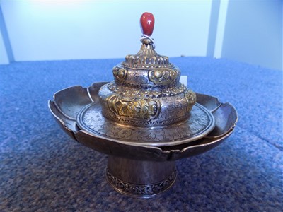 Lot 99 - Cup. A 19th century Tibetan silver cup and cover