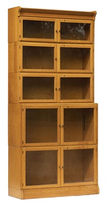 Lot 296 - Bookcase. A 1920s light oak 6-tier book case