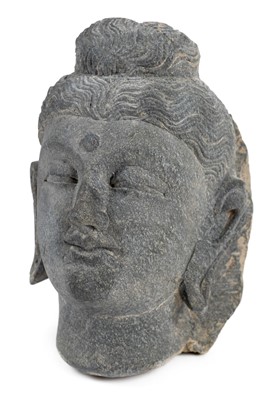 Lot 123 - Gandhara Carving. A small carved schist stone head of Bodhisattva