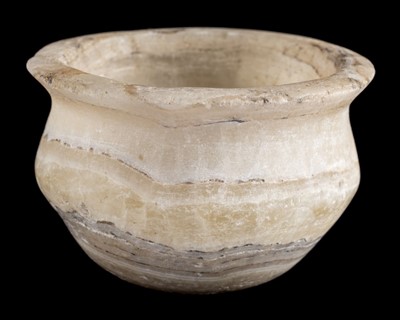Lot 119 - Alabaster Vessel. A Mesopotamian alabaster hand-carved vessel