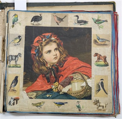 Lot 260 - Scrap Album. A large Victorian scrap album on linen leaves, 1869-79