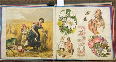 Lot 260 - Scrap Album. A large Victorian scrap album on linen leaves, 1869-79