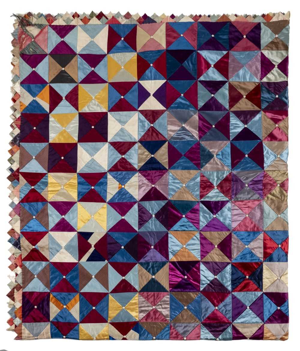Lot 183 - Quilt. A silk patchwork quilt, English, early 20th century