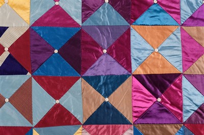 Lot 183 - Quilt. A silk patchwork quilt, English, early 20th century