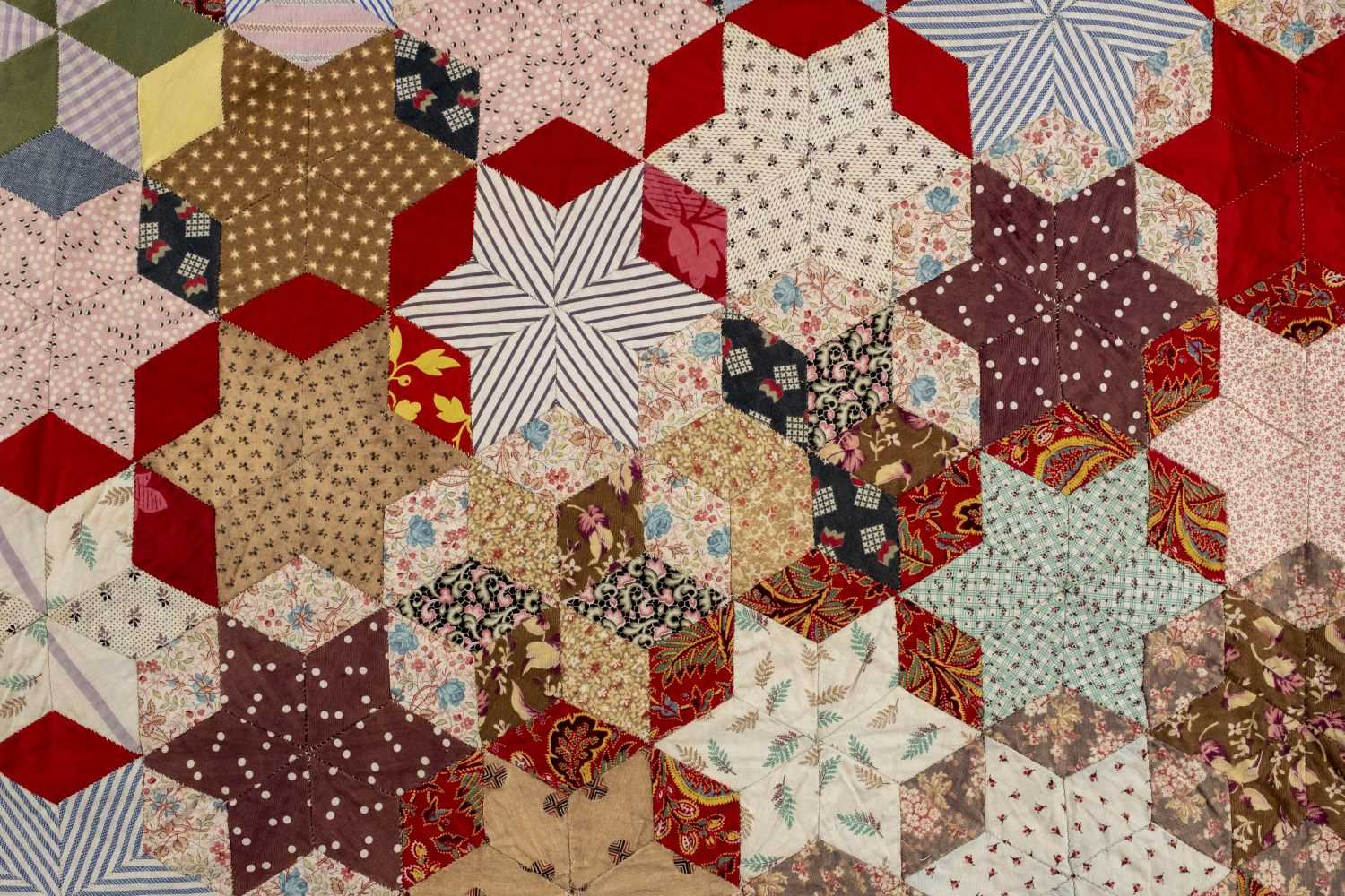 Lot 186 - Quilts. A patchwork quilt made by Mrs. Twine,  Sussex, early 20th century