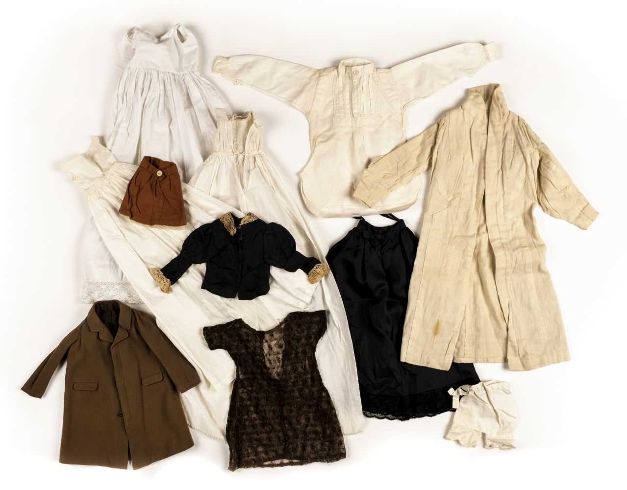 Lot 174 - Miniature clothes. A collection of miniature and dolls' clothes, 19th-20th century
