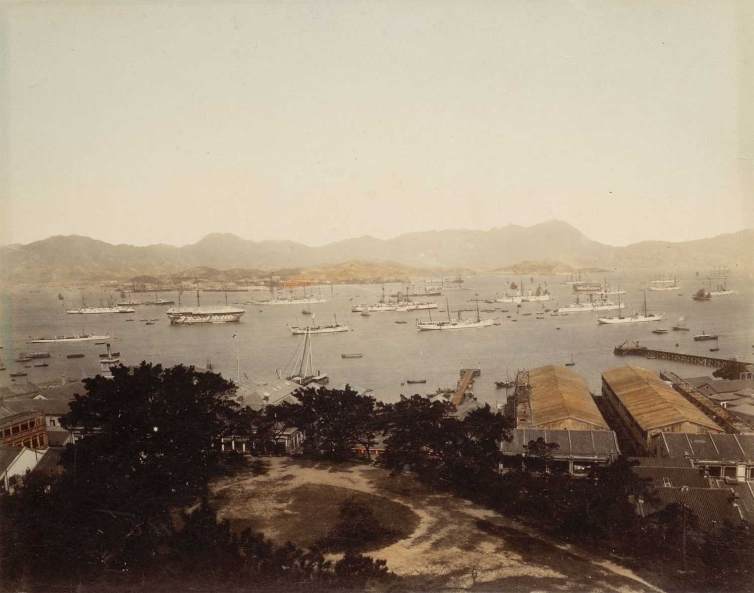 Lot 58 - Hong Kong. A group of 11 hand-coloured albumen print views of Hong Kong, c. 1880s