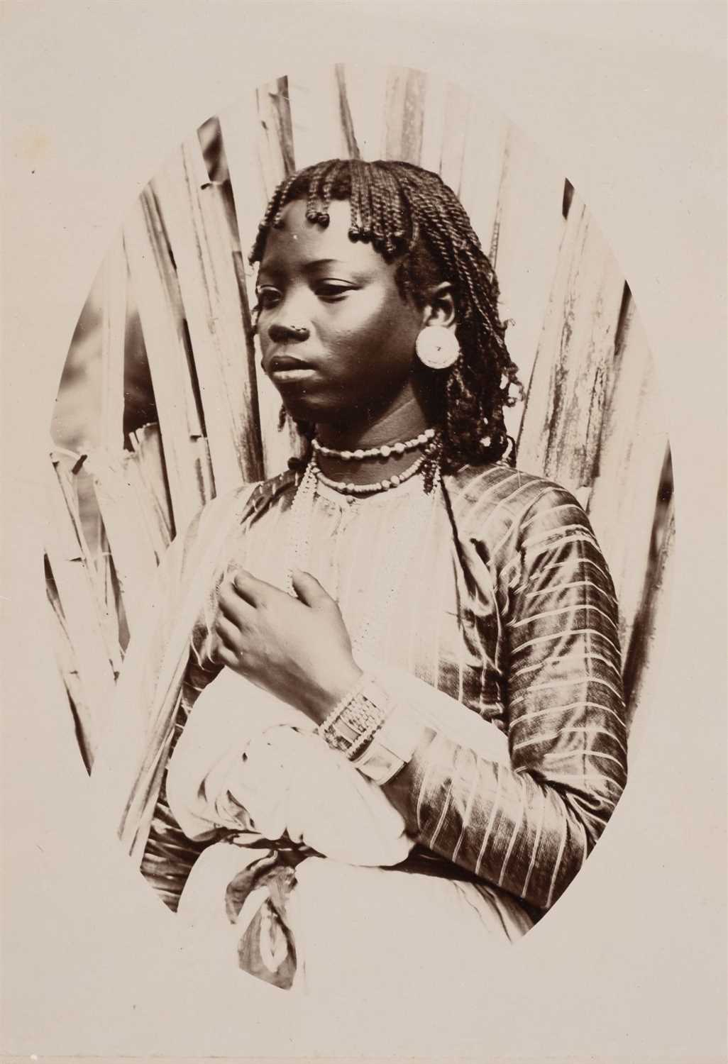 Lot 132 - Madagascar. Portrait of a young Madascar woman, circa 1910
