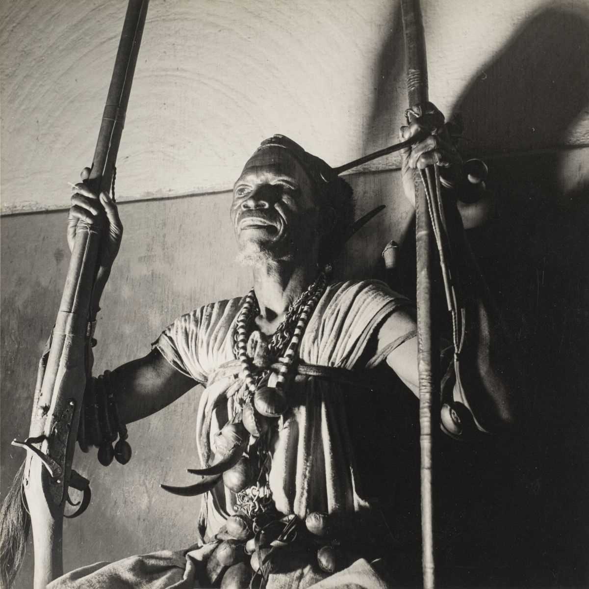 Lot 124 - Africa. A portrait of a Nigerian witch doctor, circa 1940