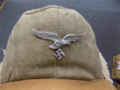 Lot 206 - WWII German hats. A Luftwaffe M43 cap and goggles