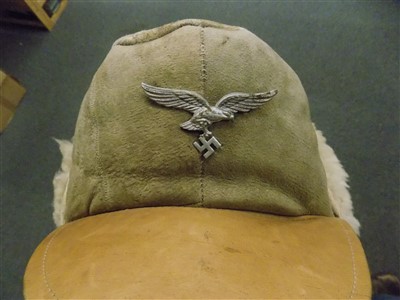 Lot 206 - WWII German hats. A Luftwaffe M43 cap and goggles