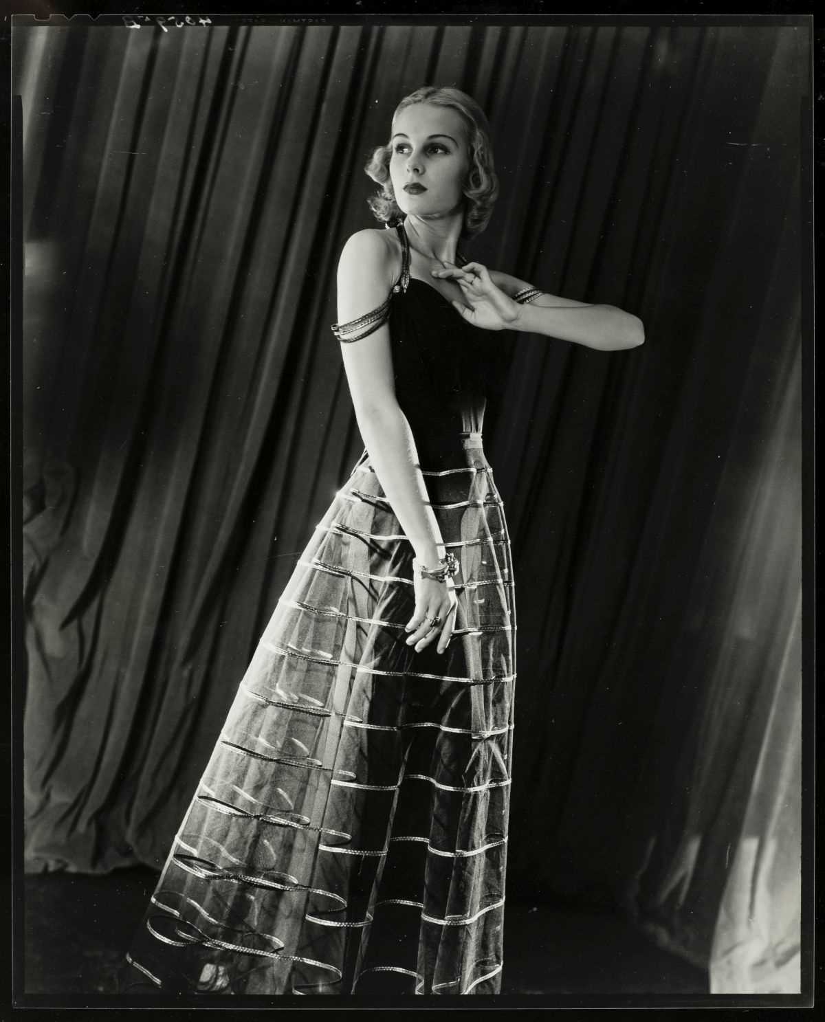 Lot 266 - Munkacsi (Martin). Three fashion contact prints on three sheets, c. 1940s, printed c. 1960