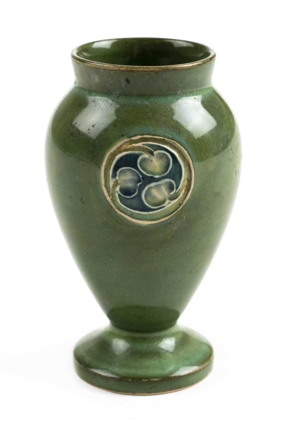 Lot 74 - Moorcroft. A Moorcroft Flammian Ware miniature vase