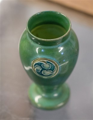 Lot 74 - Moorcroft. A Moorcroft Flammian Ware miniature vase