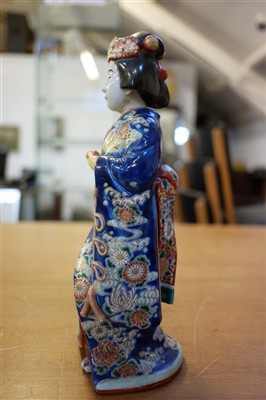 Lot 77 - Chinese figure. A 19th century porcelain figure of a Scholar