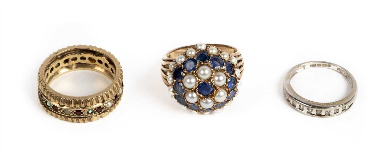 Lot 30 - Rings. A yellow metal sapphire and pearl cluster ring plus two others