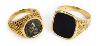 Lot 31 - Rings. An 18K gold gentleman's ring and one other
