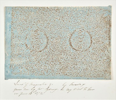 Lot 394 - Faraday (Michael, 1791-1867). An iron filings diagram fixed on wax blue paper, circa 1850s